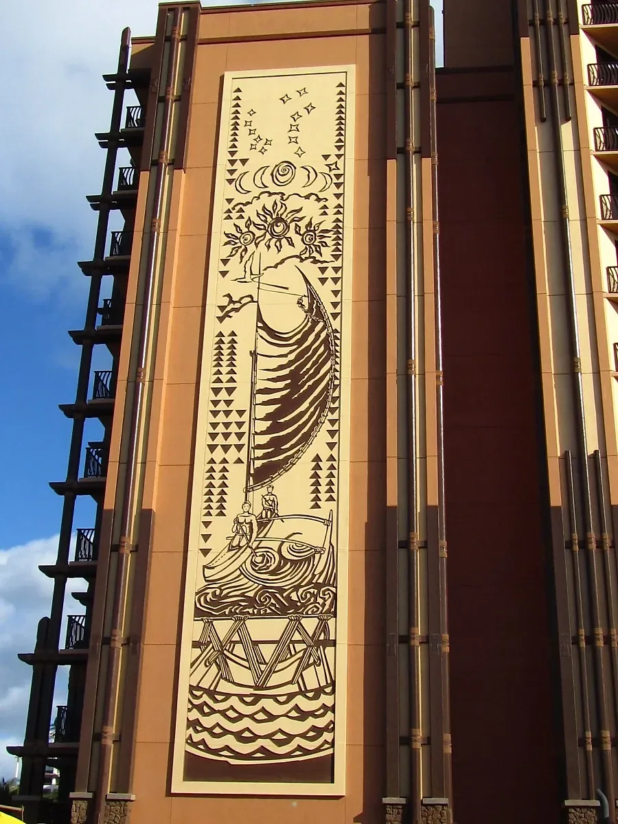 Tall artwork panel between vertical facade details