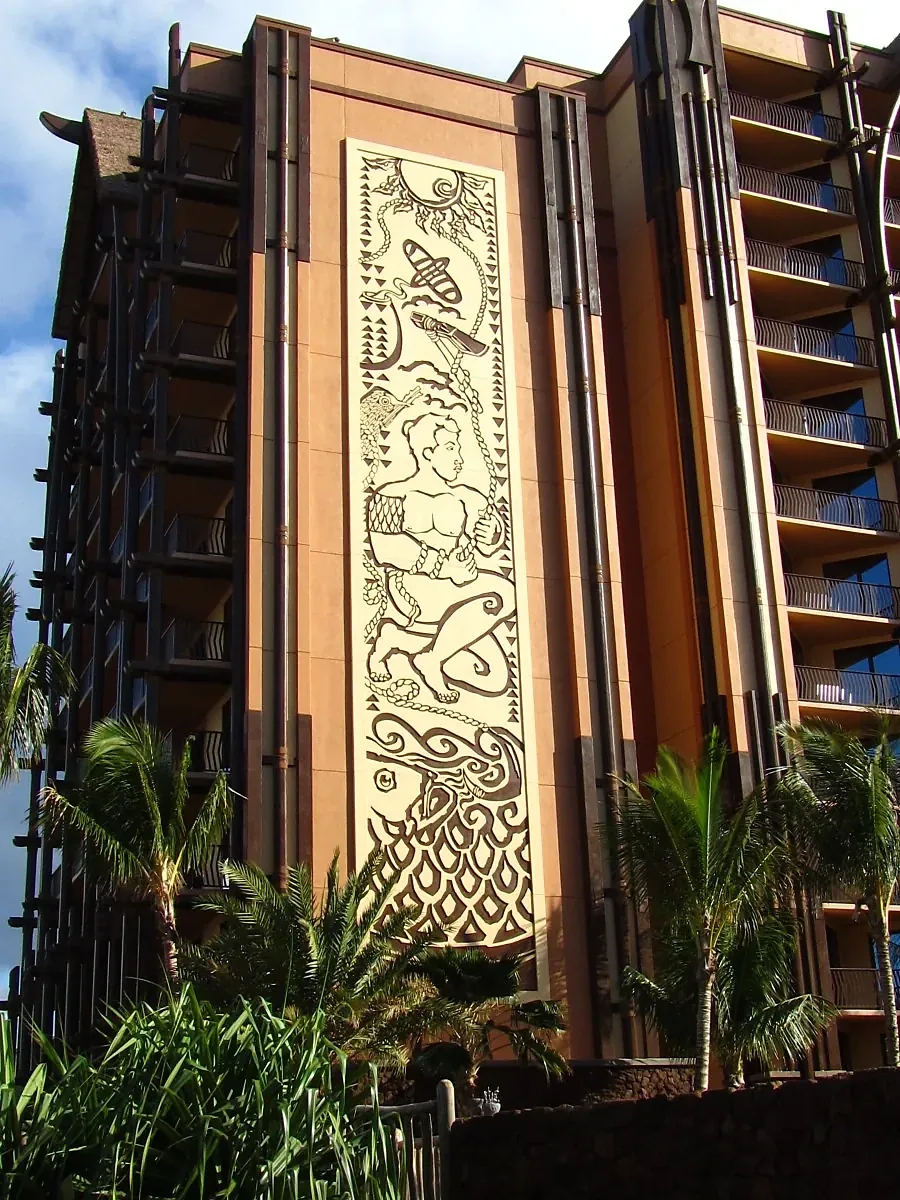 Artwork panel and vertical bands on a tall building