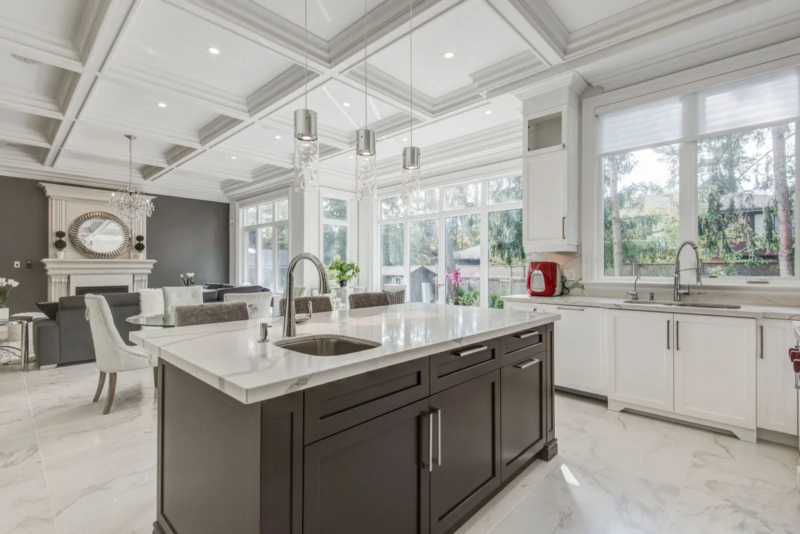 Kitchen with a coffered ceiling and tall windows